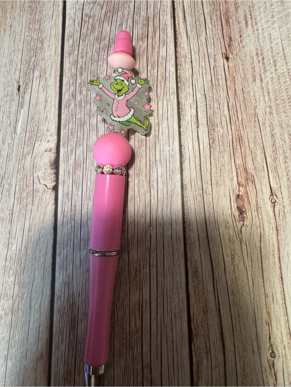 Pink grinch pen